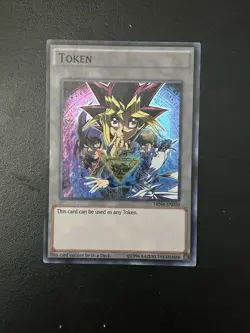 The Dark Side of Dimensions Token - TKN4-EN030 - Super Rare - NM - Image 1