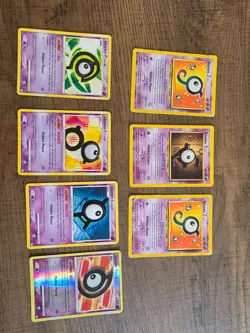 Pokemon TCG Unown X7 Card Bundle Mixed Set - Image 1