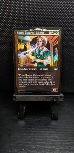 Streets Of Capenna MTG Rocco, Cabaretti Caterer #397 (Gilded Foil) - Image 1