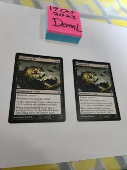 Glistening Oil Mtg Black Rare Card New Phyrexian LP/ENG x1 - Image 1