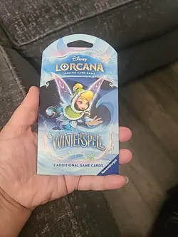 Ravensburger Disney Lorcana TCG: Winterspell Booster Pack - 12 Cards - Image 1