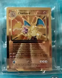 2021 POKEMON SWSH CELEBRATIONS UPC PROMO #4/102 CHARIZARD GOLD METAL CARD - Image 1