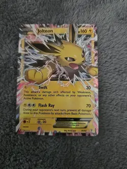 The Pokemon Company Jolteon EX Ultra Rare Holo 28/83 Generations Pokemon Card - Image 1