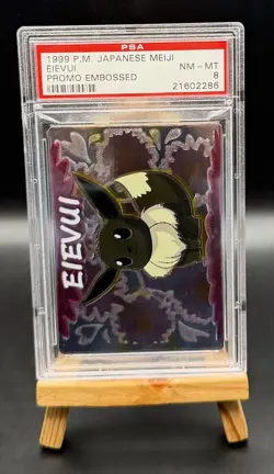 EIEVUI EMBOSSED MEIJI PROMO POKEMON JAPANESE PSA 8 - Image 1