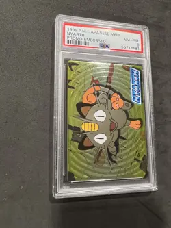 Pokemon Nyarth (Meowth) Embossed Promo from Japanese Meiji in a PSA 8 !! - Image 1