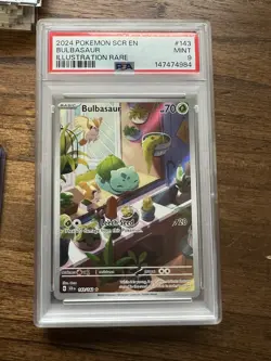 Pokemon 2024 Stellar Crown Bulbasaur 143/142 Illustration Rare Holo PSA 9 EN - Image 1