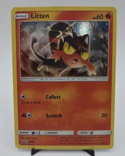 Pokemon TCG Litten SM08 Black Star Promo Cosmos Holo LP - Image 1