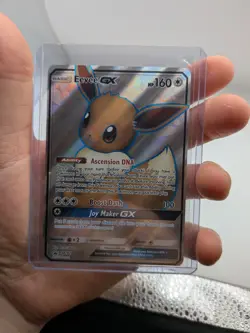 Pokemon TCG - Sun And Moon - Eevee GX SM242 - Black Star Promo NM - Image 1