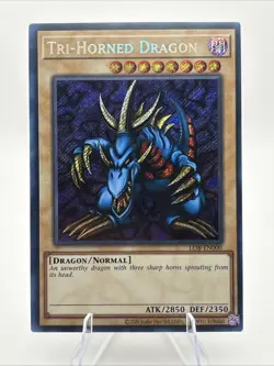 Tri-Horned Dragon LOB-000 The Legend of Blue Eyes White Dragon Unlimited NM - Image 1