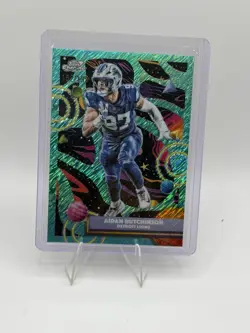2025 Topps Chrome Cosmic #34 Aidan Hutchinson Aqua Equinox Refractor #/199 - Image 1