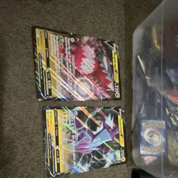 Pokemon TCG Mixed Lot: Holo Cards, Binder/Pages & Storage Tins - Image 3