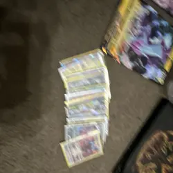 Pokemon TCG Mixed Lot: Holo Cards, Binder/Pages & Storage Tins - Image 4