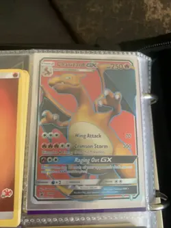old pokemon binder and rare cards including ultra rare charizard card - Image 1