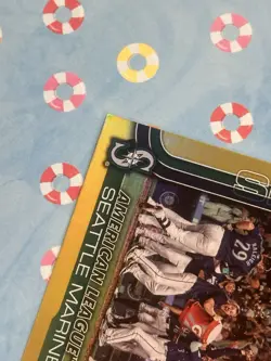 2025 Topps Series 1 Seattle Mariners 29/50 Gold Rainbow Foil #96 Team Card - Image 3
