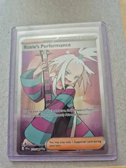Roxie's Performance 112/086 Me04: Chaos Rising Holo - Image 1
