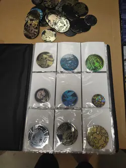Bundle of 80+ Pokemon TCG Flipping Coin collectable + Binder - Image 1