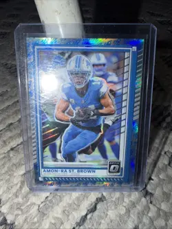 2025 Panini Donruss Optic Amon Ra St Brown #66 Rocket Emoji SP - Image 1