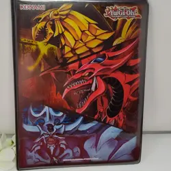 YUGIOH KONAMI OFFICIAL SLIFER, OBELISK, AND RA 9-POCKET DUELIST PORTFOLIO - Image 1