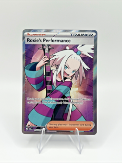 Roxie's Performance 112/086 Ultra Rare ME04: Chaos Rising Pokemon Holo Near Mint - Image 1