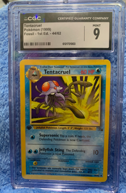 -CGC 9 MINT Tentacruel 1999 Fossil 1st Edition 44/62 Pokemon Card - Image 1
