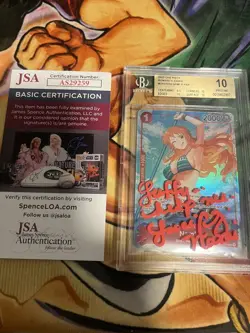 2022 One Piece Romance Dawn OP01-016 Nami BGS 10 Pre-Errata Autographed By Luci - Image 1