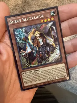 Surge Blitzclique 1st Edition Secret Rare CORI-EN011 Yu-Gi-Oh! - Image 1