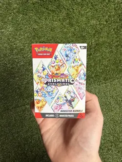 Pokemon TCG Prismatic Evolutions Booster Bundle Sealed In Hand - Image 1