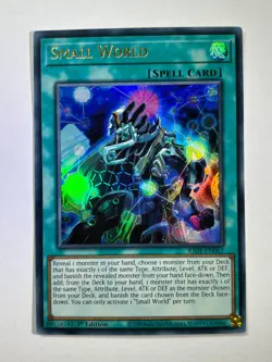 Small World RA01-EN067 Ultra Rare 1st Edition YuGiOh Card NM - Image 1