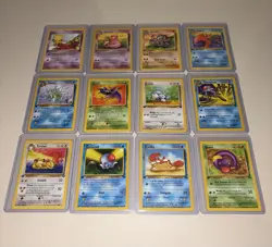 Pokemon 12-Card 1st Edition Lot Rocket Fossil Jungle Non-Holo English 1999 - Image 1