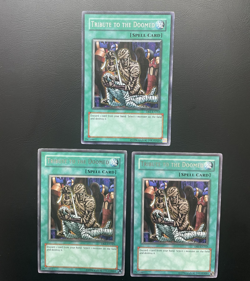 Yugioh Tribute to The Doomed DB1-EN165 Rare Unlimited Edition MP/HP X3 - Image 1
