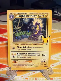 Light Toxtricity SWSH137 Black Star Promo 25th Celebrations LP Pokemon Holo - Image 1