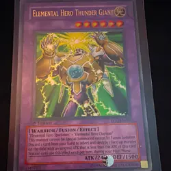 Konami Yu-Gi-Oh! TCG Elemental Hero Thunder Giant TLM-EN036 1st Ed Holo UR Eng - Image 1