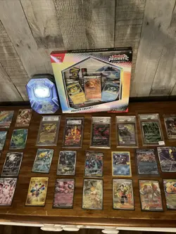 🔥Huge Pokemon Lot Sealed Prismatic Poster,Gem 10 GRADED CARDS, Promos And MORE! - Image 1