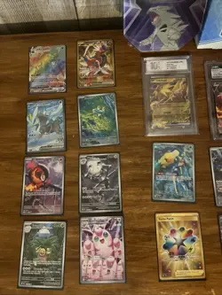 🔥Huge Pokemon Lot Sealed Prismatic Poster,Gem 10 GRADED CARDS, Promos And MORE! - Image 2