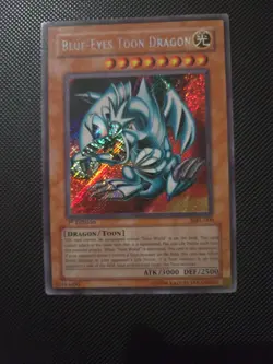 Yu-Gi-Oh! TCG Blue-Eyes Toon Dragon MRL-000 1st Edition Secret Rare - Image 1