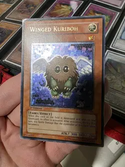 Yu-Gi-Oh Winged Kuriboh TLM-EN005 Ultimate Rare UTR 1st Edition - MP / DMG - Image 1