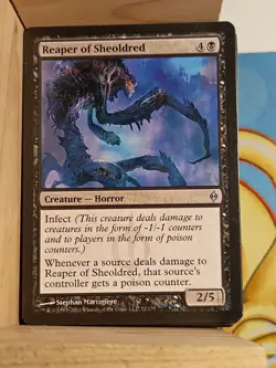 Reaper of Sheoldred New Phyrexia Regular - Image 1