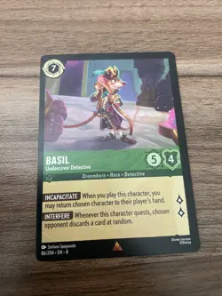 Disney Lorcana TCG Basil - Undercover Detective 86/204 Reign of Jafar - Image 1