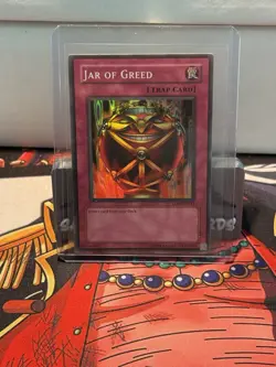Yu-Gi-Oh Jar of Greed Super Rare Unlimited Edition LON-047 - Image 1