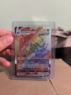 Pokemon Evolving Skies Rayquaza VMAX 217/203 Rainbow Rare small bend in corner - Image 1