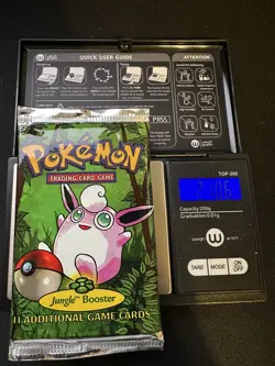 1999 Pokemon Unlimited Jungle Booster Pack: ⭐ HEAVY Pack 21.06g w/ acrylic case - Image 1
