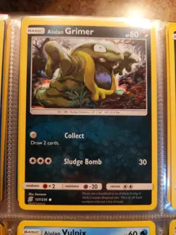 Alolan Grimer 127/236 Unified Minds Pokemon Card LP - Image 1