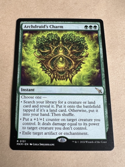 MTG - Archdruid's Charm - Murders at Karlov Manor - Image 1