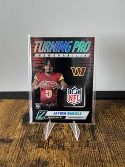 Jayden Daniels 1 OF 1 NFL SHIELD 2024 Panini Zenith Turning Pro Memorabilia - Image 1