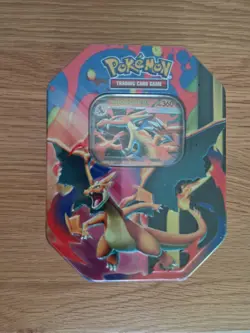Pokemon TCG: Megan Charizard Tin - 4 Boosters & 1 Foil Promo Card Charizard Y Ex - Image 1