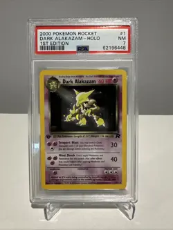 PSA 7 - 2000 POKEMON ROCKET #1 DARK ALAKAZAM-HOLO 1ST EDITION - Image 1