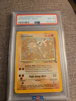 PSA 8 Hitmonlee 7/62 1999 Fossil Holo Rare Graded Pokemon Card - Image 1