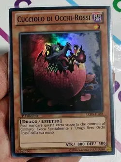 CUCCIOLO DI OCCHI ROSSI YU-GI-OH LCJW-IT038 SUPER RARA 1* Ed NUOVA NEAR MINT - Image 1