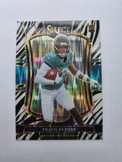 2025 Panini Select - Premier Level Travis Hunter #128 Zebra Shock Prizm (RC) - Image 1