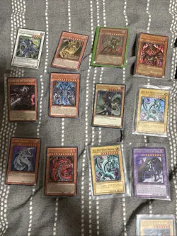 Yugioh! 255 Holo Lot! Blue Eyes, Dark Magician, 2 Sealed Holo packs plus 2 mats - Image 1